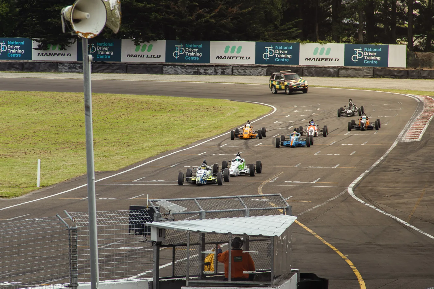 Blake Dowdall in close racing at Manfeild